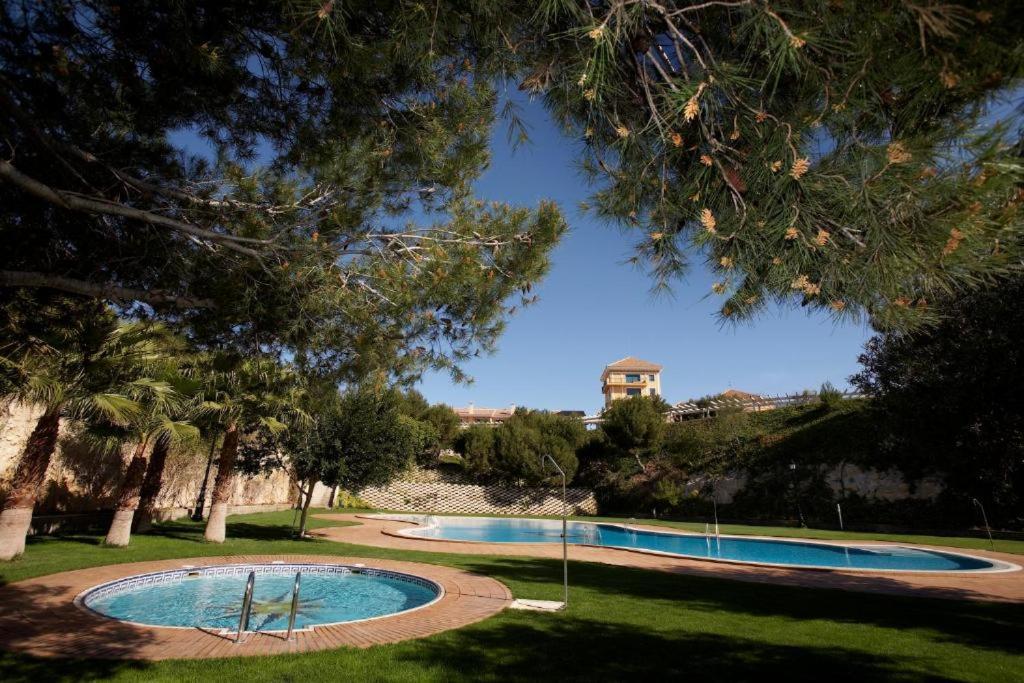Apartamentos Lomas De Campoamor Bagian luar foto
